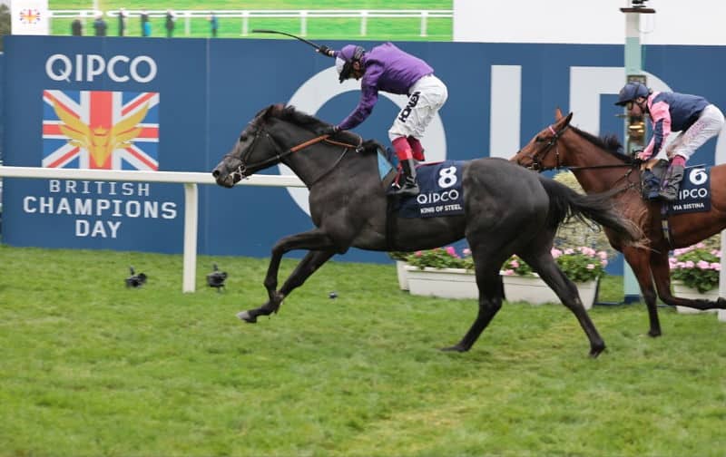 british champions day race winner crossing the line